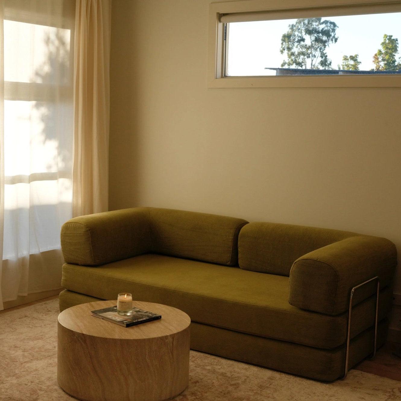 Nova Sofa Bed Slim in Matcha – soft green tone, sleek and space-saving design, foldable for lounging or sleeping, ideal for small modern spaces